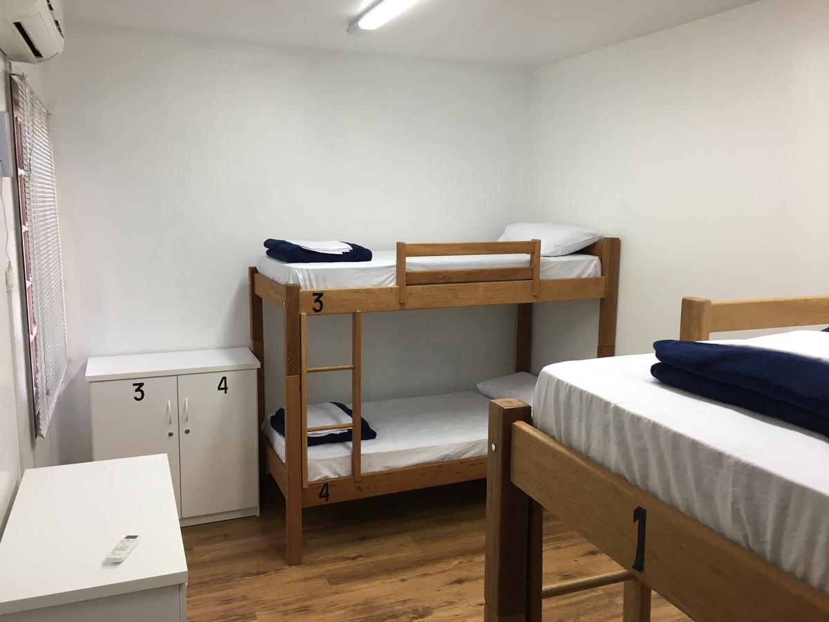 Cama em Dormitório Masculino com 4 Camas